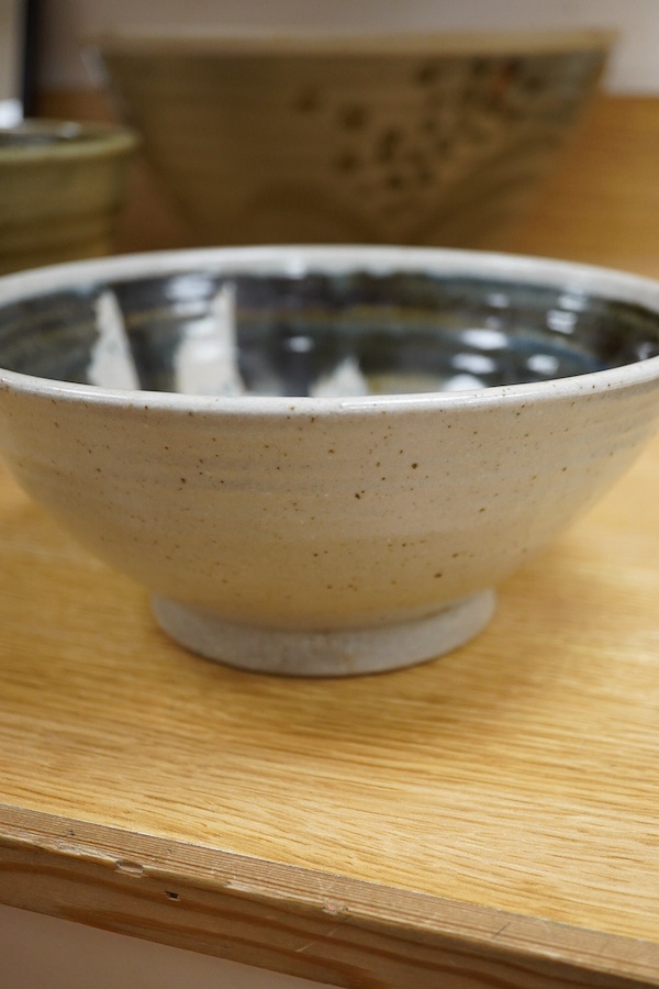 Three studio pottery bowls, one signed ‘A’ to the base, largest 34cm in diameter. Condition - good